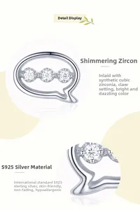 Detailed macro of S925 sterling silver speech bubble stud earrings with cubic zirconia stones