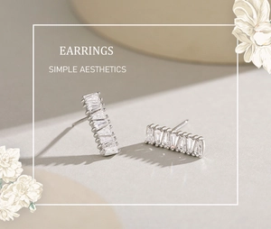Vue macro de boucles d'oreilles en argent S925 avec zircons cubiques taille baguette