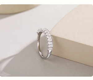 Detail view of s925 silver ring featuring rectangle-cut zircon stones on a geometric prop