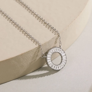 Elegant s925 silver daisy pendant necklace with inlaid zircon on a stone pedestal