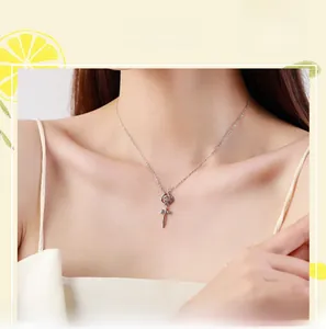 Close-up of S925 silver rose flower pendant with sparkling cubic zirconia on a model