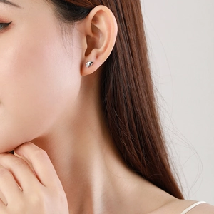 Elegant s925 sterling silver angel wing stud earrings with crystal on female model