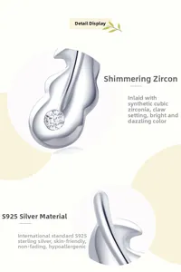 Detail of s925 silver leaf earrings featuring prong-set cubic zirconia stones