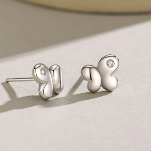 Polished s925 sterling silver butterfly stud earrings with micro zircon stone inlay