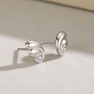 Polished S925 sterling silver mini angel wing stud earrings with sparkling round crystals