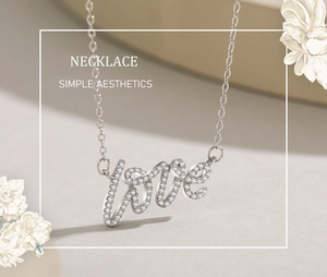 Macro view of S925 silver LOVE pendant necklace with pavé-set cubic zirconia detail