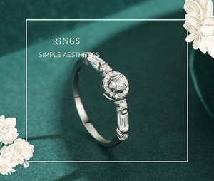 Close-up of s925 silver ring with zircon stones on green velvet background