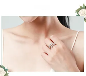 Detailed close-up of S925 sterling silver bypass ring with marquise cut zircon on finger