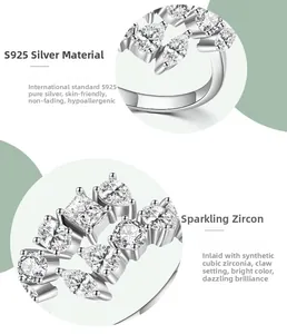 Detail of S925 sterling silver ring with cubic zirconia marquise and square cut stones