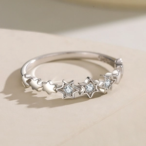 Elegant S925 sterling silver ring featuring sparkling micro-pave stars in a polished finish