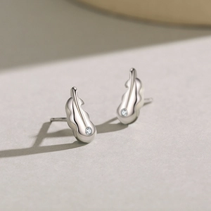 Minimalist S925 sterling silver leaf stud earrings with sparkling cubic zirconia accents