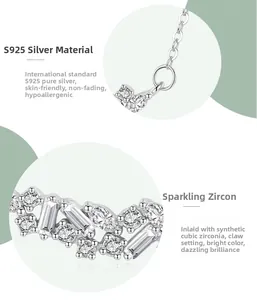 Macro detail of S925 sterling silver necklace with prong-set cubic zirconia stones