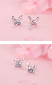 Détail des boucles d'oreilles papillon en argent s925 avec zircons et poinçon s925
