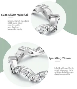Detail of S925 sterling silver ring featuring marquise and round cubic zirconia in claw setting