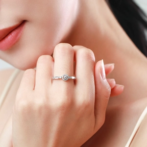 Elegant S925 sterling silver ring with micro-pave center zircon and baguette side stones