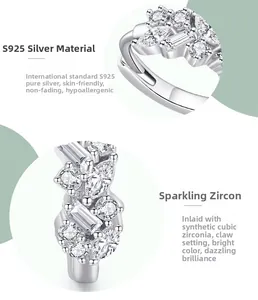 Macro detail of S925 sterling silver ear cuff showing zircon stones and prong setting