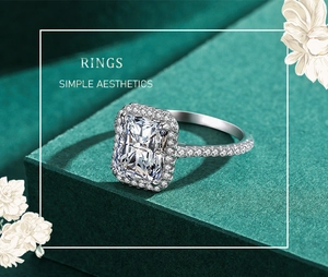 Detailed macro shot of rectangular 3ct silver ring with diamond halo and paved band