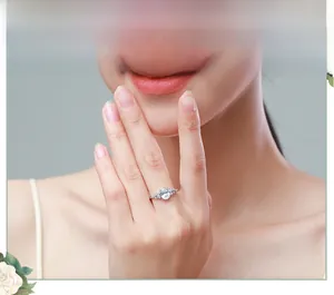Elegant s925 silver ring with oval zircon stone worn by a model in a refined setting