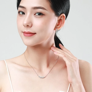 Minimalist S925 sterling silver necklace and earring set with irregular zircons on model