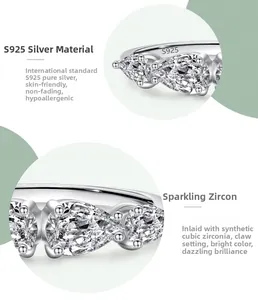 Close-up of S925 sterling silver stamp and pear-cut zirconia stone in a prong setting