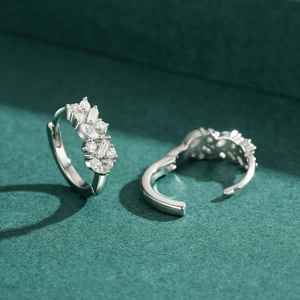 S925 sterling silver hoop earrings featuring irregular marquise and round cut zircons