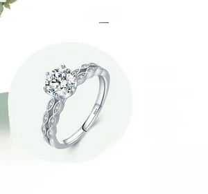 Detailed close-up of S925 sterling silver ring with hollow woven band and 1ct diamond simulant