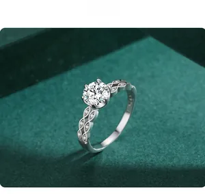 Detail of S925 sterling silver ring with 1ct round cubic zirconia and wavy hollow band