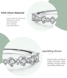 Detail of S925 sterling silver ring featuring zircon stones in a classic claw setting