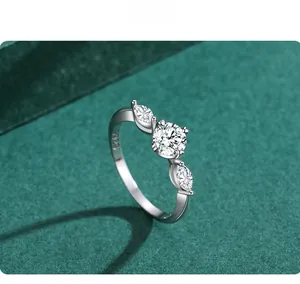 Macro view of S925 sterling silver ring showing the S925 hallmark and three-stone setting