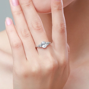 Elegant s925 silver engagement ring with oval cubic zirconia on model's hand