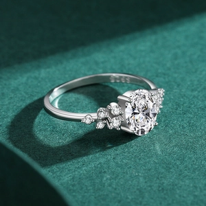 S925 sterling silver ring featuring a large oval zircon and clusters of small stones
