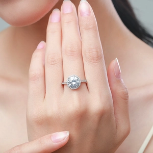 Luxury 925 sterling silver ring with 5ct halo diamond crystal on a female model hand
