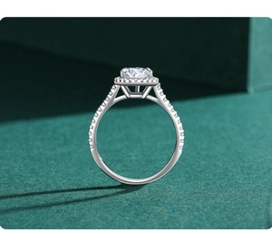 Side view of luxury S925 sterling silver halo ring with a 3ct round cut diamond simulant