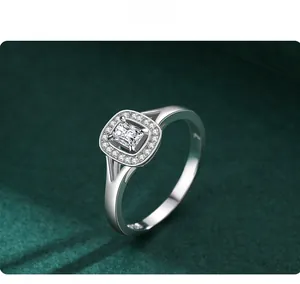 Close-up of S925 sterling silver ring with emerald-cut cubic zirconia and halo setting