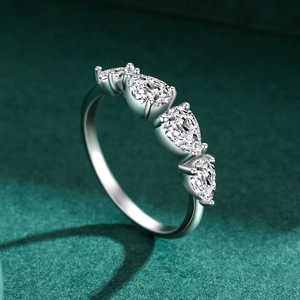 Elegant S925 sterling silver ring with four pear-shaped zircons in a minimalist luxury style