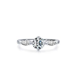 Elegant S925 sterling silver four-prong ring with round and marquise-cut CZ stones