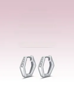 Close-up of S925 sterling silver hexagon hoop earrings with pavé set zircon stones