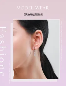 Effet porté d'élégantes boucles d'oreilles en argent S925 avec zircons scintillants