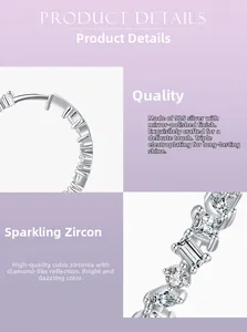 Macro detail of S925 silver hoop earrings featuring irregular cubic zirconia inlays