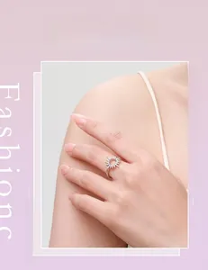 Model wearing a sunflower shaped S925 sterling silver ring with shimmering cubic zirconia