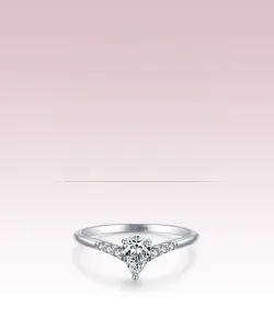 Close-up of S925 sterling silver ring with pear cut cubic zirconia and V-shaped band