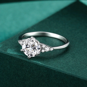 Elegant S925 silver 1ct moissanite ring with six-prong setting and wing-style side accents