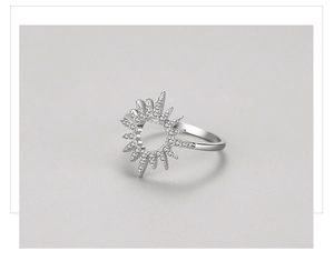 Macro shot of sparkling zircon sunflower starburst ring in 925 sterling silver