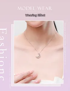 Model wearing s925 silver moon pendant necklace with cubic zirconia details