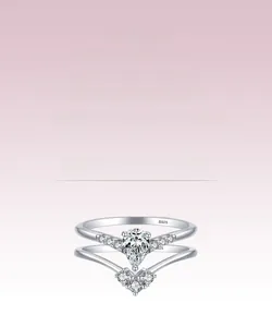 Macro shot of S925 sterling silver ring set featuring a pear-cut simulated diamond