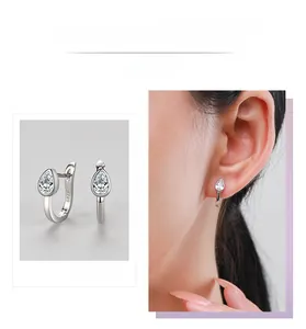 Detail of S925 sterling silver drop earrings with water-drop shaped cubic zirconia