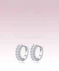 Macro view of S925 sterling silver hoop earrings with baguette-cut zircon stones
