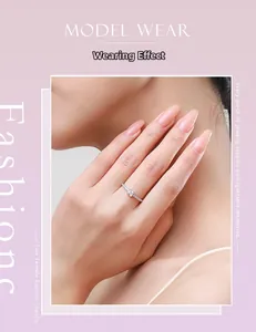 Close-up of a square cut solitaire ring with micro-pave setting on a model's finger