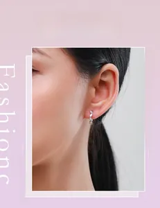 Close-up of S925 sterling silver ear cuff with marquise zircon stones on model