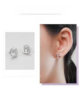 Détail et vue portée de boucles d'oreilles lune en argent S925 avec zircons cubiques
